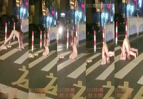 醉酒女半夜脱光光在马路中间模拟性交被路过的司机按喇叭围观喝彩